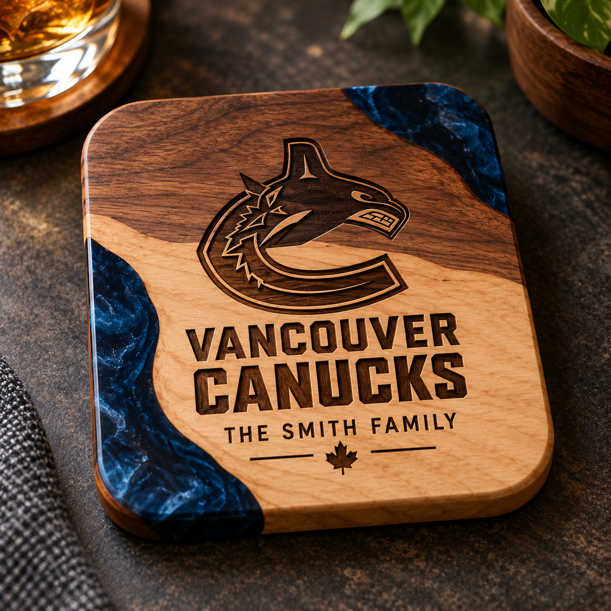 Personalized coaster blending light and dark wood with blue accents